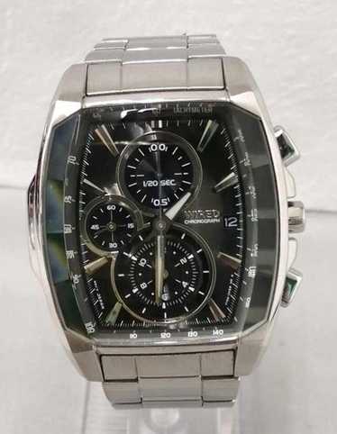 wired quartz watch 7t92 - Gem