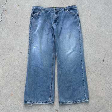 パンツ 1990s timberland baggy denim pants Vintage 90s Raw Blue Timberland graphic baggy jeans | Depop