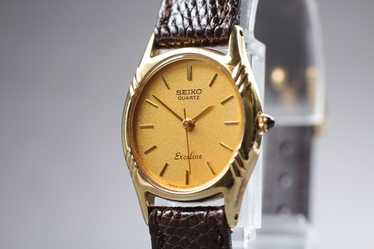 〇Nc左1045 昭和レトロ SEIKO QUARTZ DM303E オレンジ 〇Nc左1045 昭和レトロ SEIKO QUARTZ DM303E オレンジ（No.2614