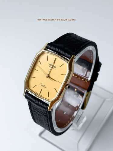 SEIKO QUARTZ 6020 ゴールド ブラックレザー dolce il_1080xN.6386806836_cm1h.jpg