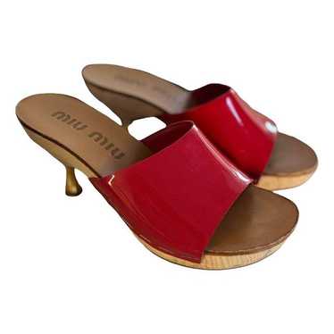 靴 Miu Miu Leather Mules Leather mules in black - Miu Miu | Mytheresa