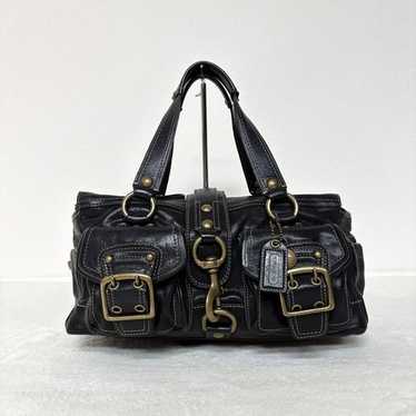 Coach legacy 65th turnrock - Gem