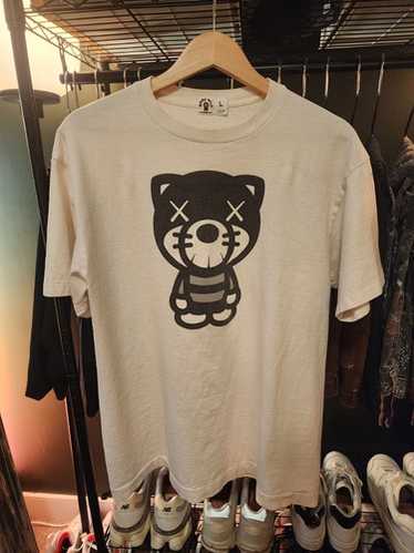 APE BAPE KAWS BABY MILO ダウンベスト　XL CAMO s-l1200.jpg