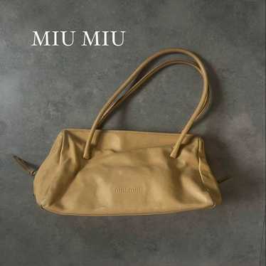 バッグ miumiu 90s Archive Canvas Duffel bag miumiu 90s Archive Canvas Duffel bag - メルカリ