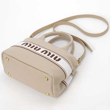 バッグ miumiu 90s Archive Canvas Duffel bag archive MIU MIU canvas hand bag | NOIR ONLINE
