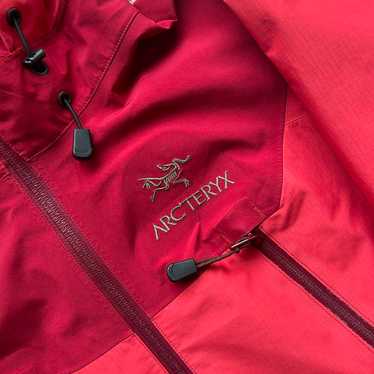 ARC'TERYX スノーボードウェア Lサイズ ピンク/赤 ARC'TERYX(アークテリクス) レディース・スノーウェア(スポーツ