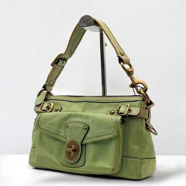 Coach legacy 65th turnrock - Gem