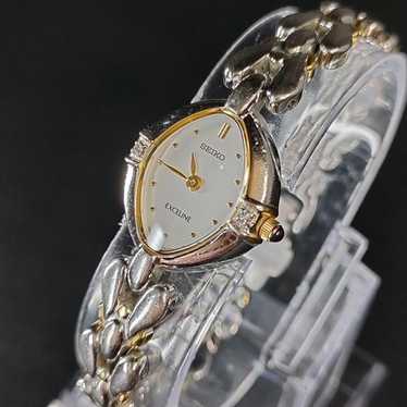 【稼働/良品】SEIKO クオーツ 1F21-0A50 MOOREA アイボリー 稼働/良品】SEIKO クオーツ 1F21-0A50 MOOREA アイボリー 楽天