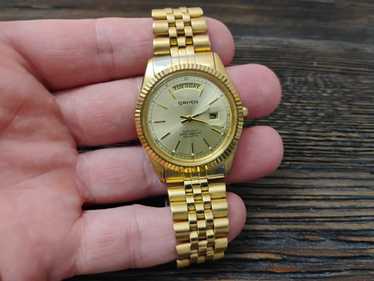 GRUEN ゴールド クォーツ時計 C902 Retro Gruen Quartz Watch With Day and Date in Gold Tone