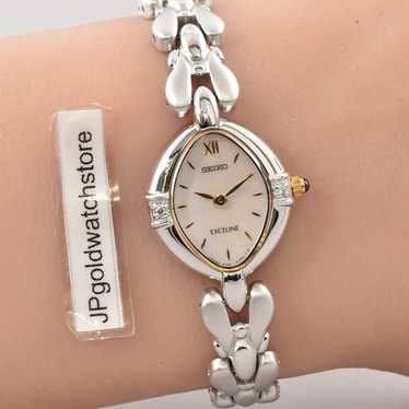 Seiko Exceline 1F20‑6B60 シルバー ゴールド Seiko Exceline Diamond 1F20-6B60 Vintage Women's Watch in