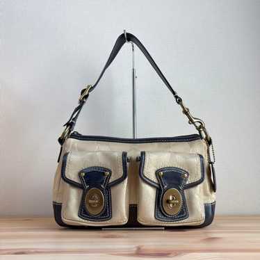 バッグ Coach Legacy Signature Turn Lock Pouch Coach signature legacy turnlock - Gem