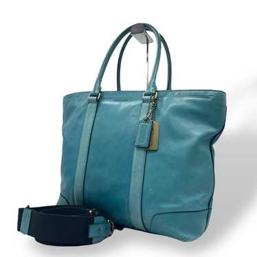 バッグ Coach Bleecker Legacy Tote Bag Leather COACH Bleecker Legacy Leather Weekend Tote in Orange | Lyst