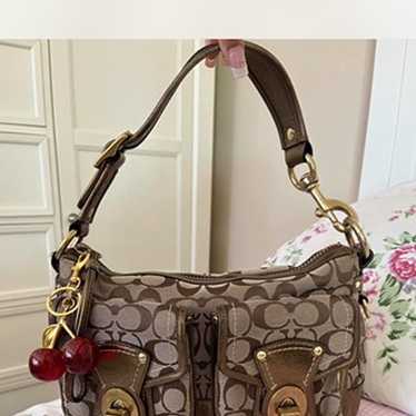 Coach legacy 65th womens - Gem