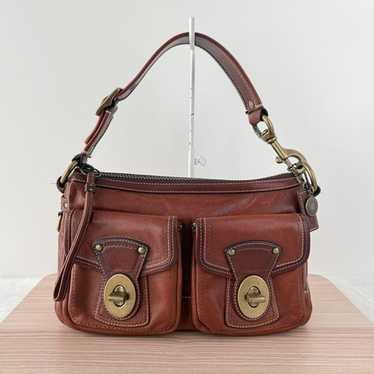Coach legacy 65th turnrock - Gem