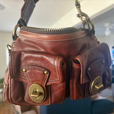 Coach legacy 65th turnrock - Gem