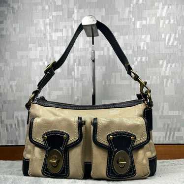 Coach legacy turn lock - Gem