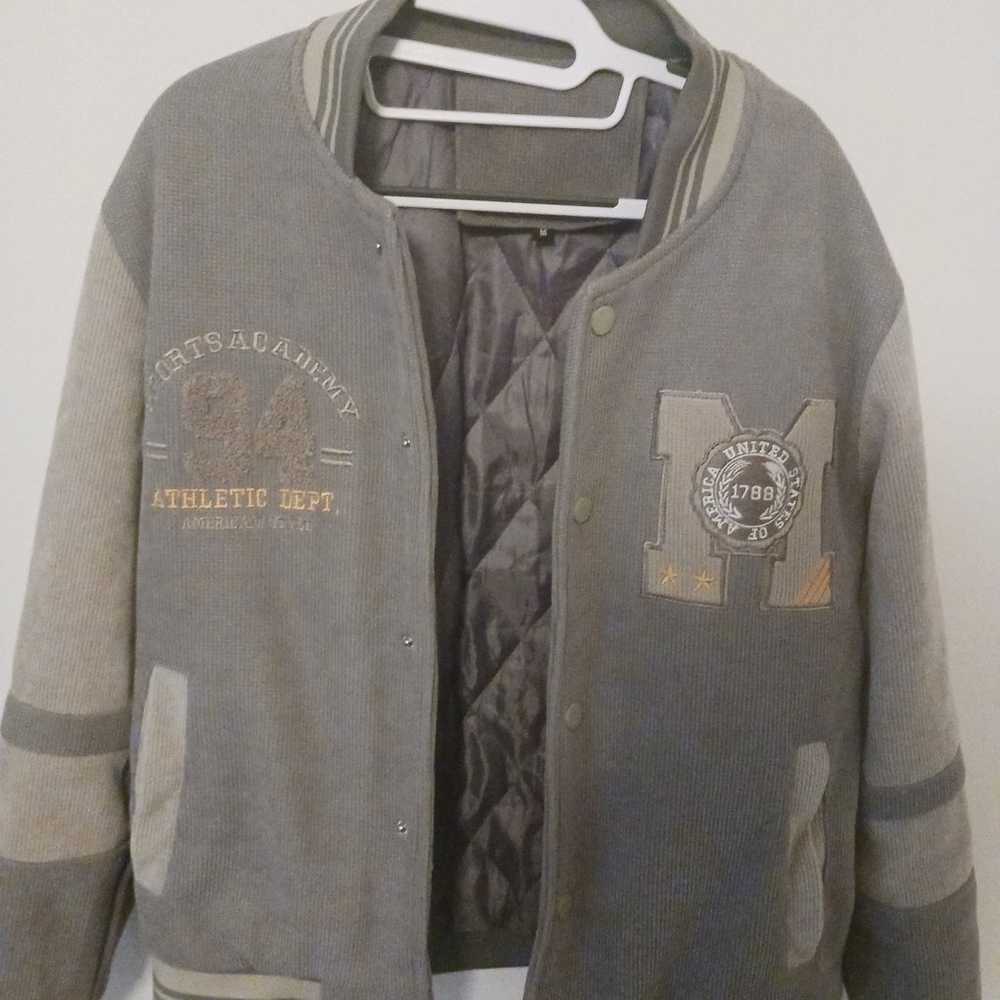 Shell: 100% Polyester. Lining: 100% Polyester - image 1