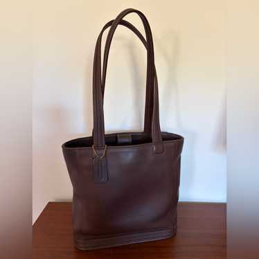 バッグ Coach Bleecker Legacy Tote Bag Leather COACH Bleecker Legacy Leather Weekend Tote in Orange | Lyst