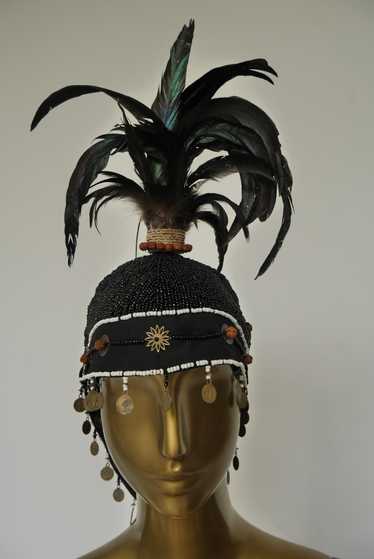 Handmade beaded balinesian cap with feathers. Trib