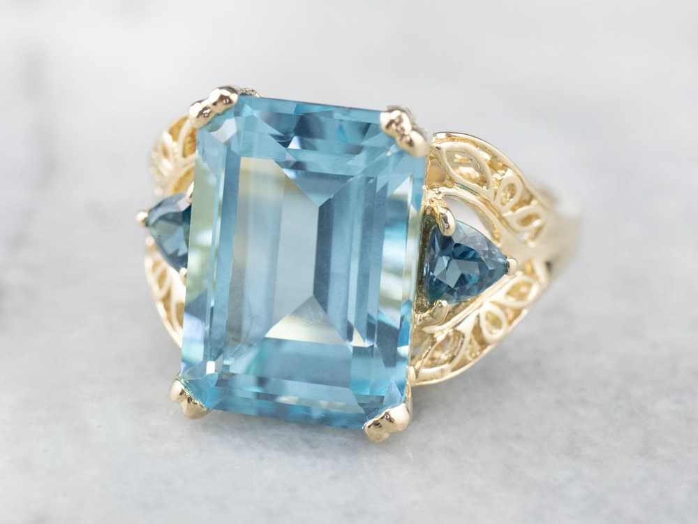 Three Stone Blue Topaz Gold Cocktail Ring - image 3