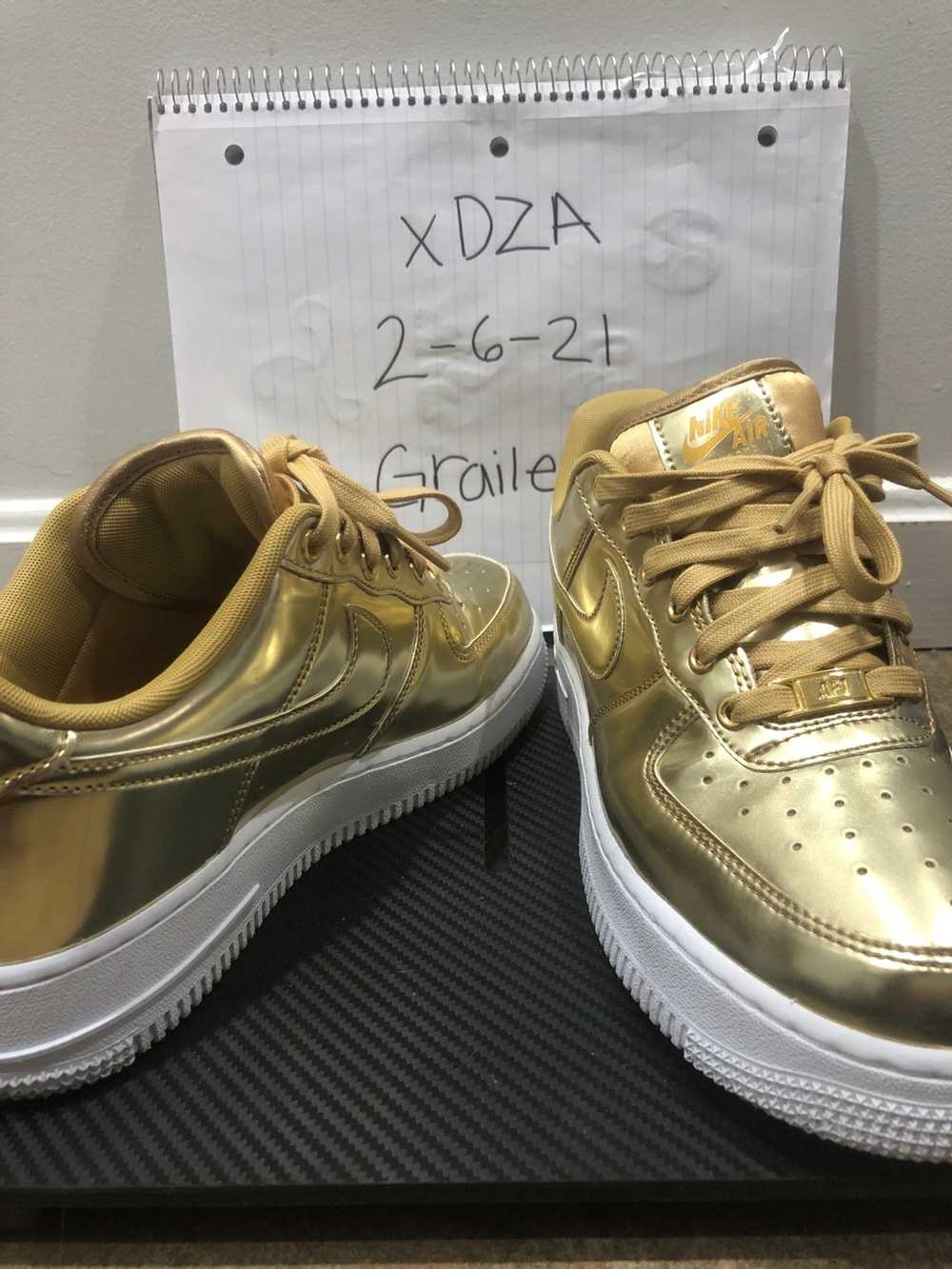 nike air force gold metallic