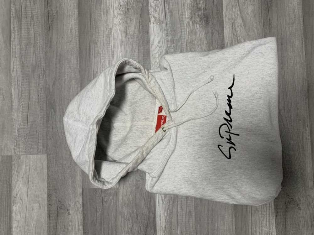 Supreme cursive hot sale hoodie