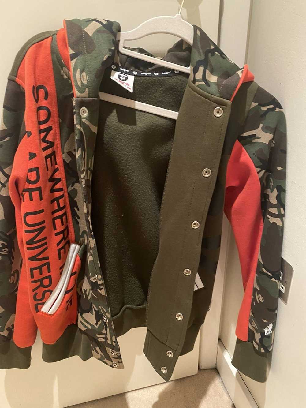 Buy Aape By A Bathing Ape men camouflage long sleeve hooded jacket  windbreaker jacket black and dark grey combo Online