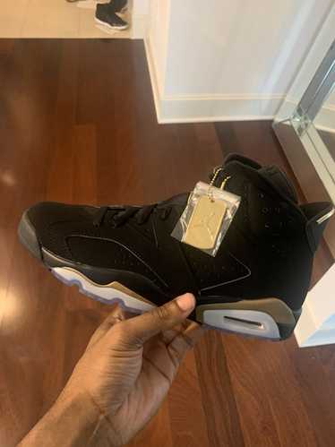 Vintage Jordan 6 Black and Gold