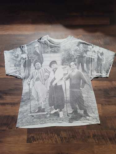 https://img.gem.app/319568697/1t/1696139690/vintage-3-stooges-tee-size-xxl-fits-like-an-xl.jpg