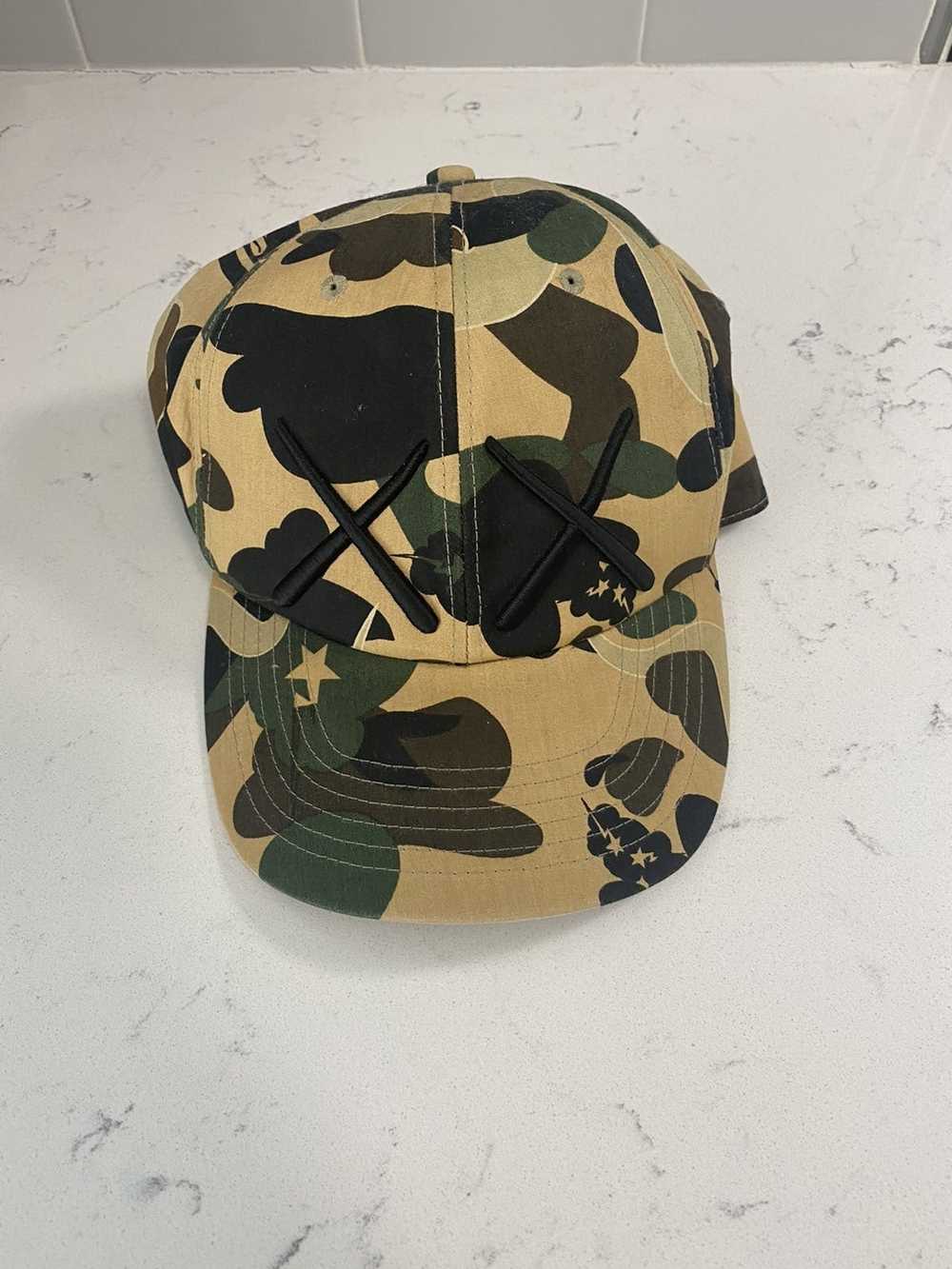 Bape × Kaws Bape x kaws bendy camo fitted hat - image 1