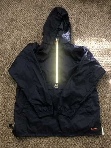 Nike raincoat black and on sale white