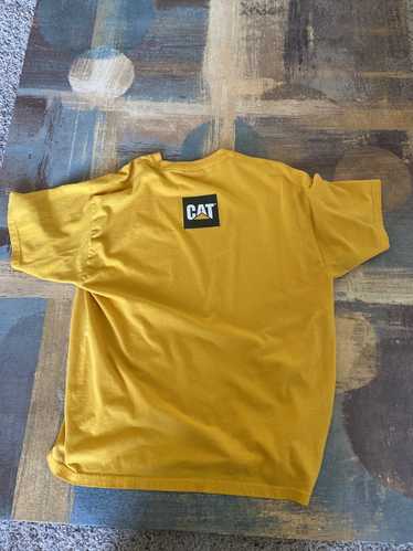 Vintage Yellow t-shirt with CAT machine on the bac