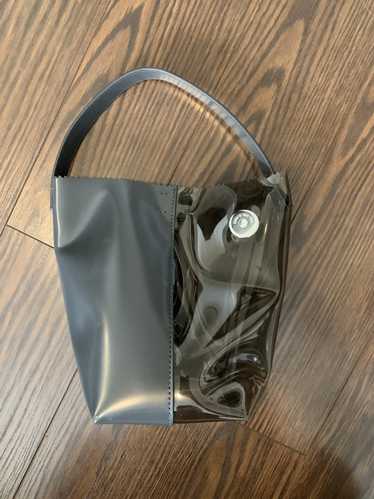 Ssense KARA grey/transparent contrast bucket bag