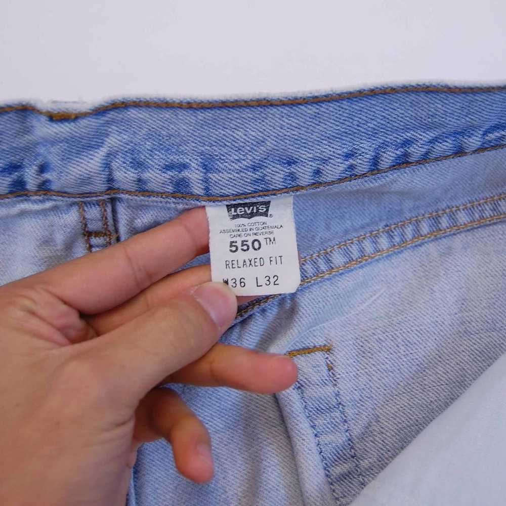 Levi's × Vintage 1999 550 Light Wash Denim Jeans - image 9