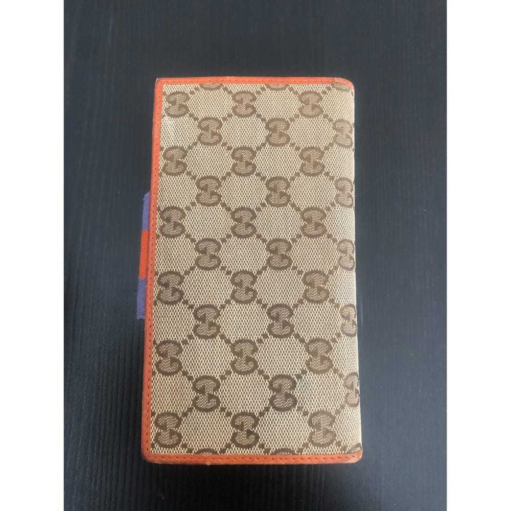Gucci Continental cloth wallet - image 12
