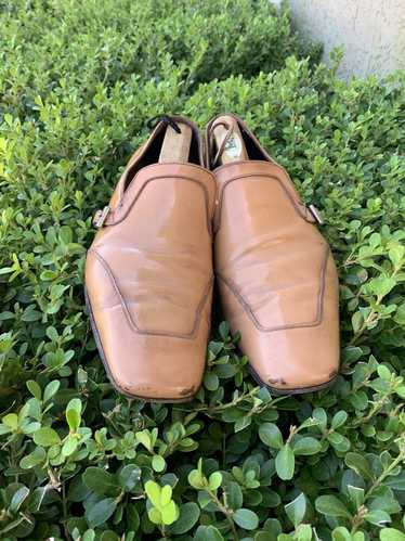 Prada Antique Tanned Leather slip ons w/side buckl