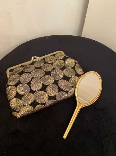 Vintage gold embroidered coin purse with handheld 