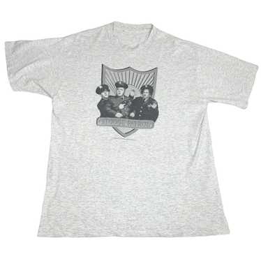 https://img.gem.app/448757955/1t/1695628671/vintage-vintage-90s-3-stooges-t-shirt-grey-stooge.jpg