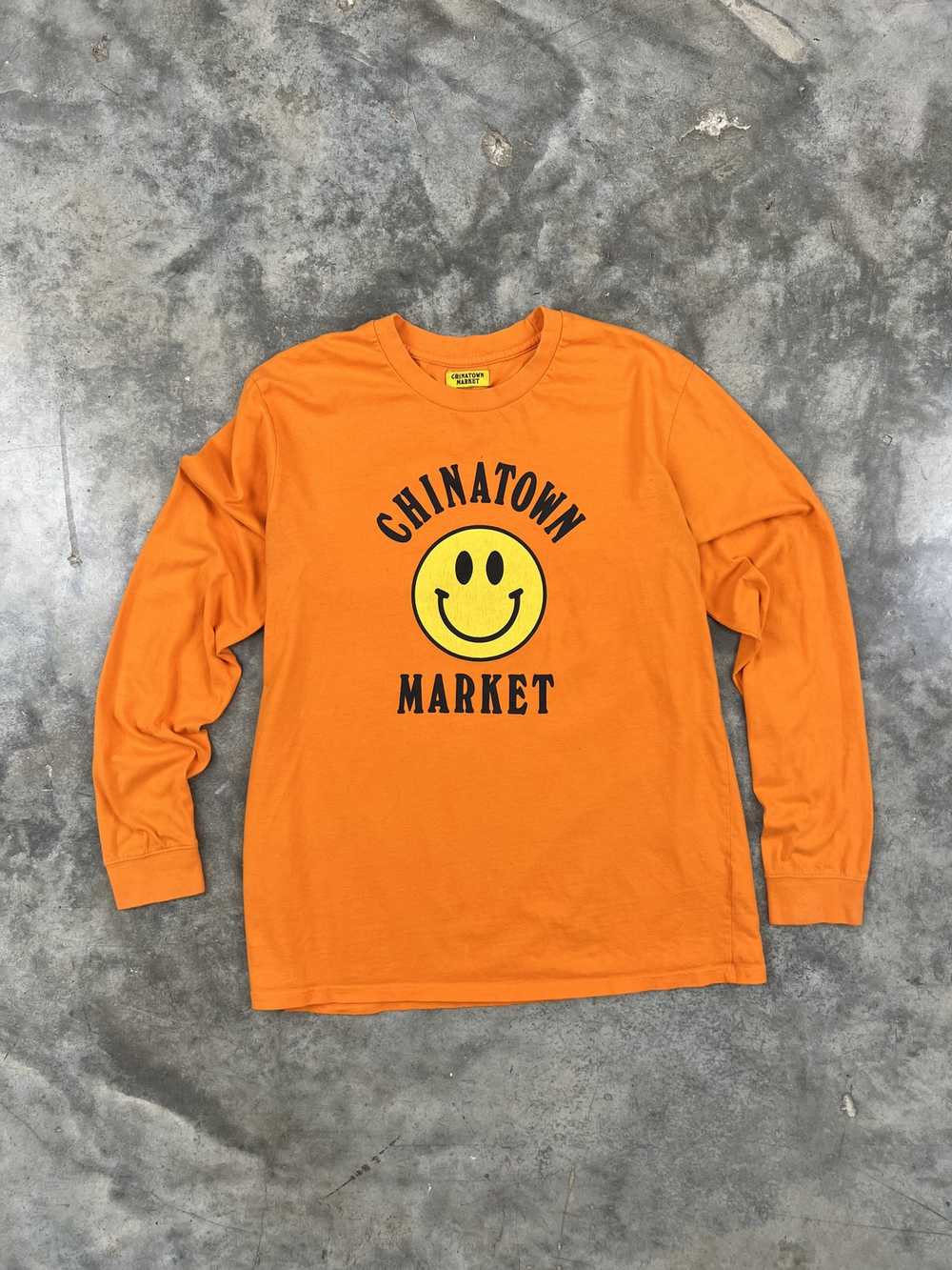 Market Chinatown Market Orange Smiley Face Logo L… - image 1