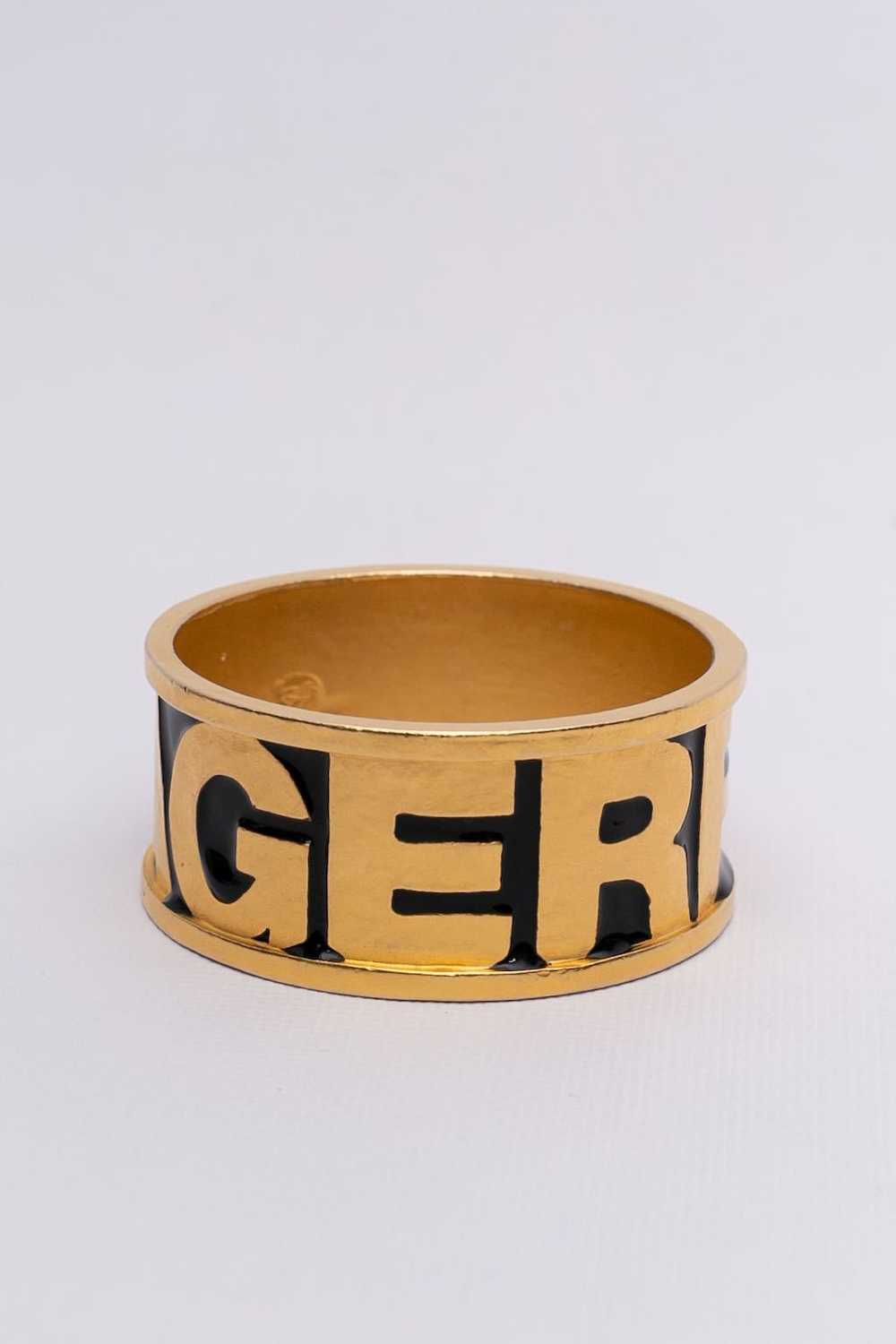 Karl Lagerfeld pair of golden bracelets - image 4