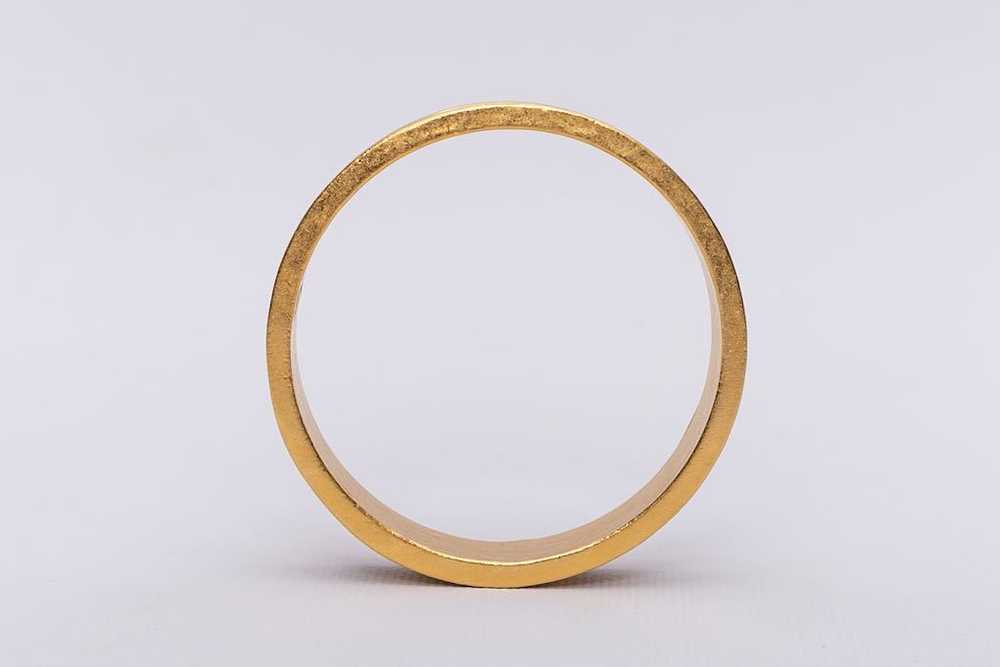 Karl Lagerfeld pair of golden bracelets - image 9