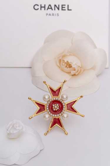 Chanel cross-shaped brooch