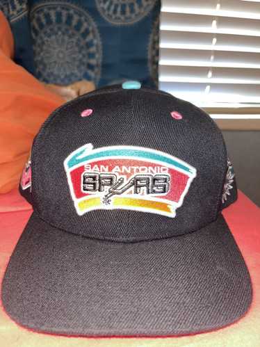 Mitchell & Ness Black and teal spurs snap back