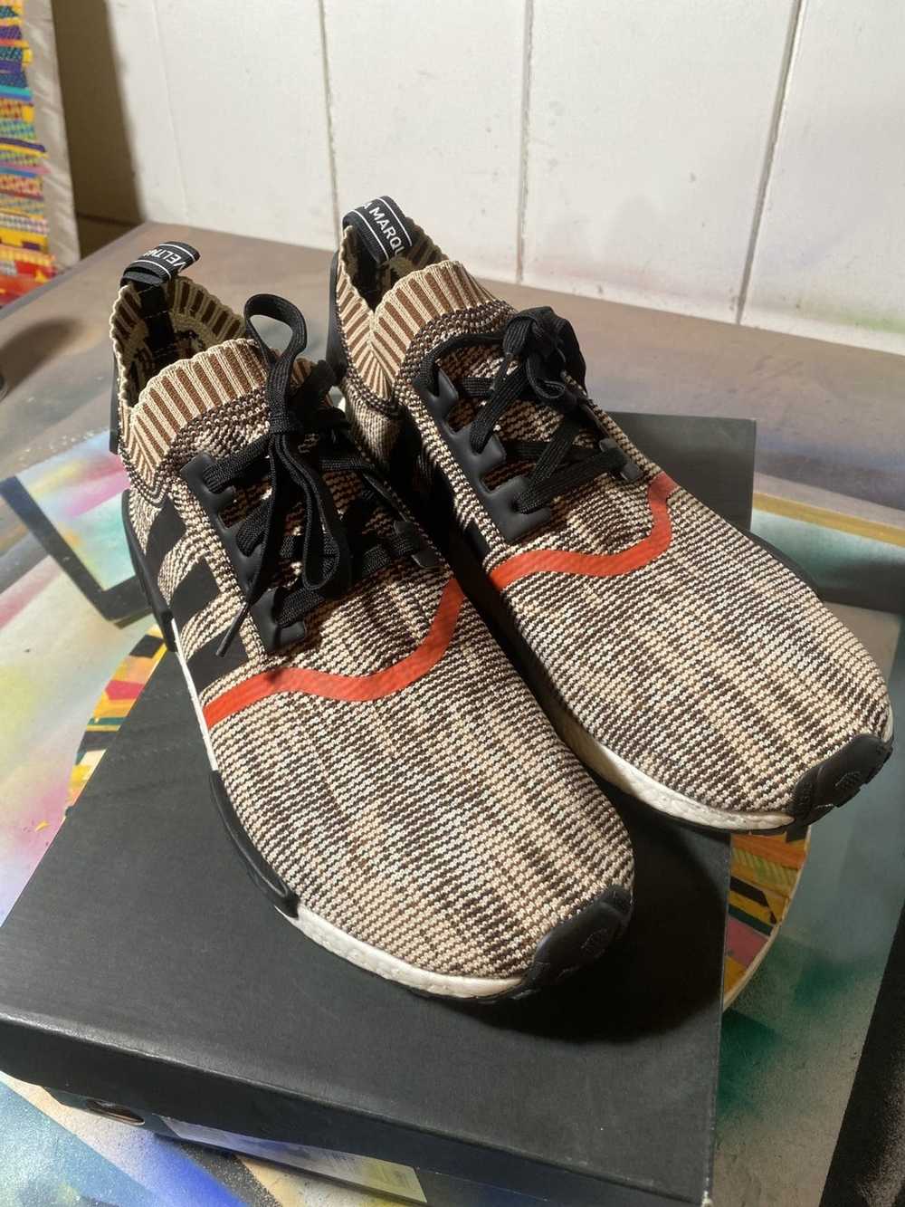 Adidas nmd r1 clearance ai camo black orange