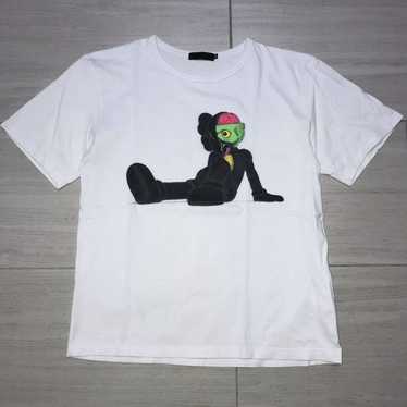 SUPREME x KAWS – TheInkFactor