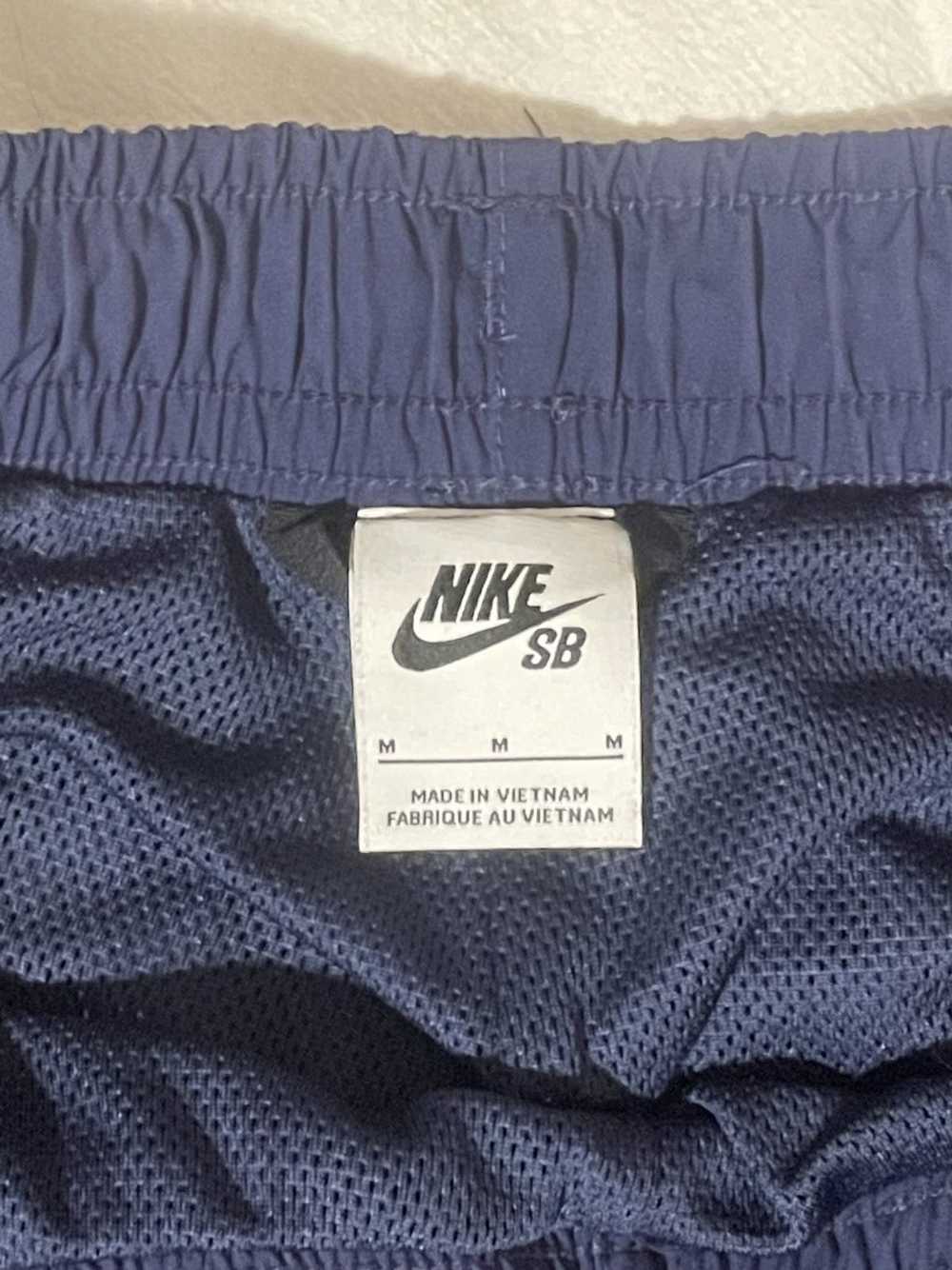 royal blue nike track pants