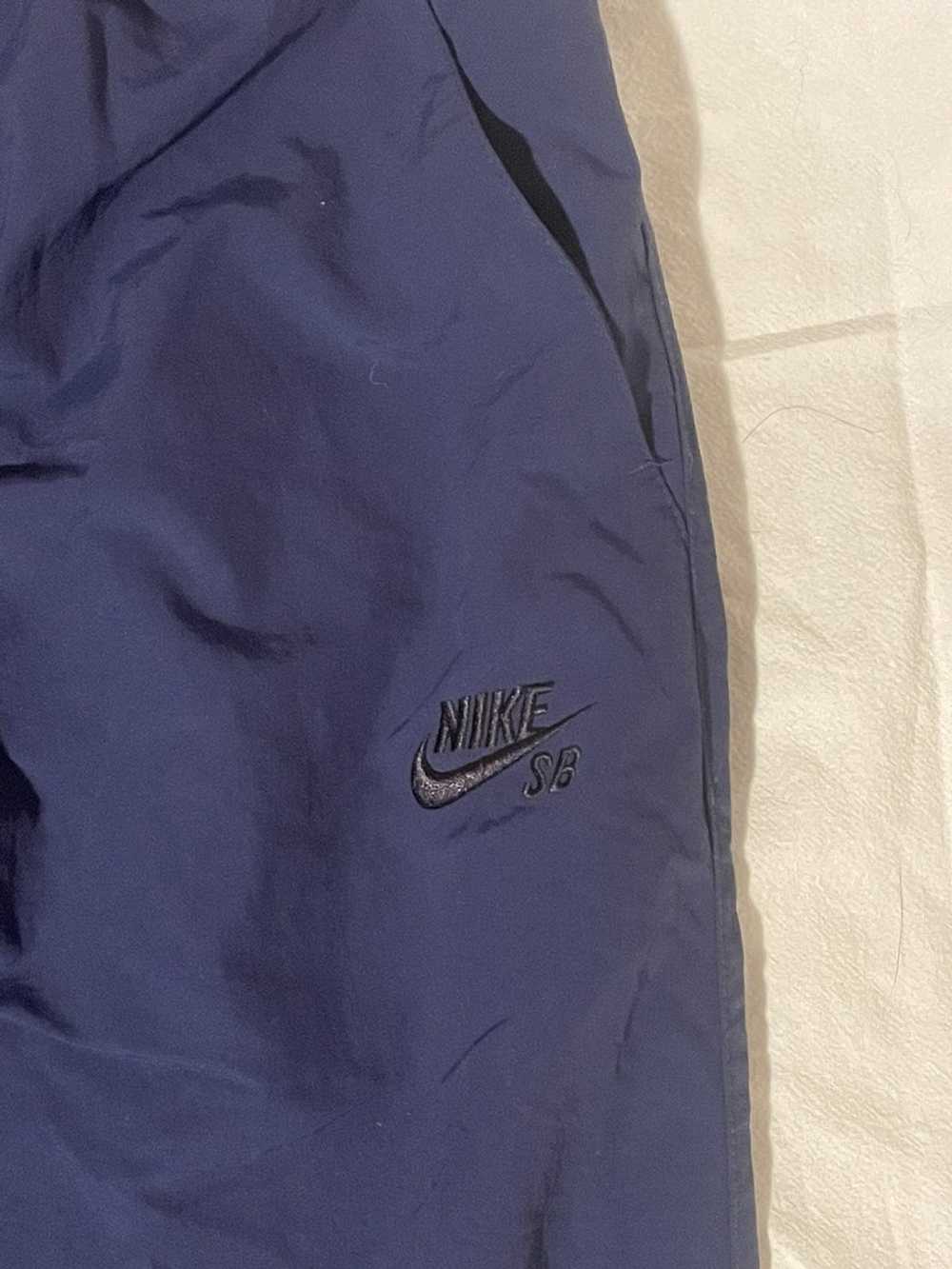 royal blue nike track pants