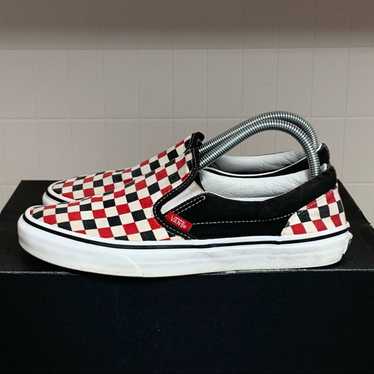 Red and black on sale checkered vans slip ons