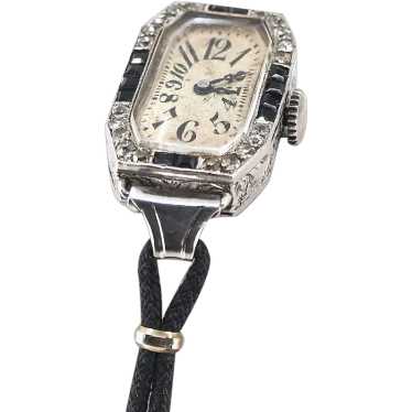 Antique Art Déco watch in platinum onyx and  diamo