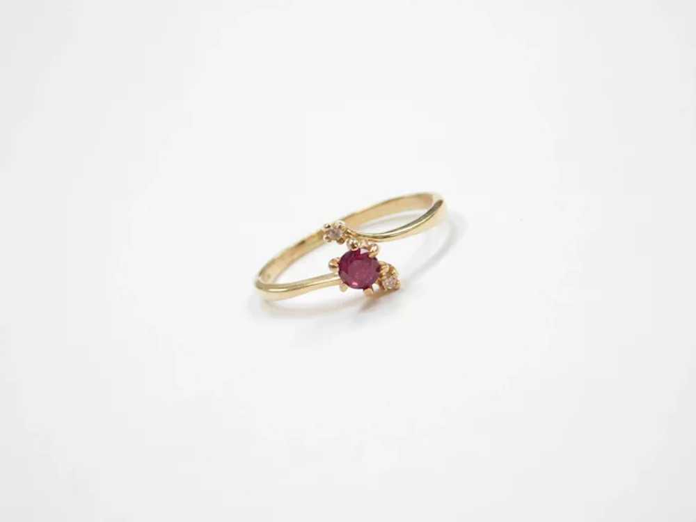 10k Gold .32 ctw Ruby and Diamond Bypass Ring - image 2